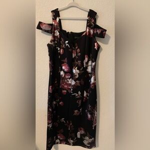 Floral and flirty dress. Worn once, like new. Size 8.